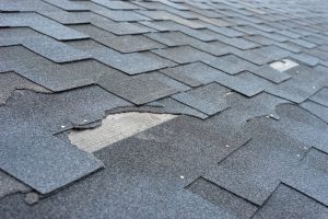 damaged and broken shingles