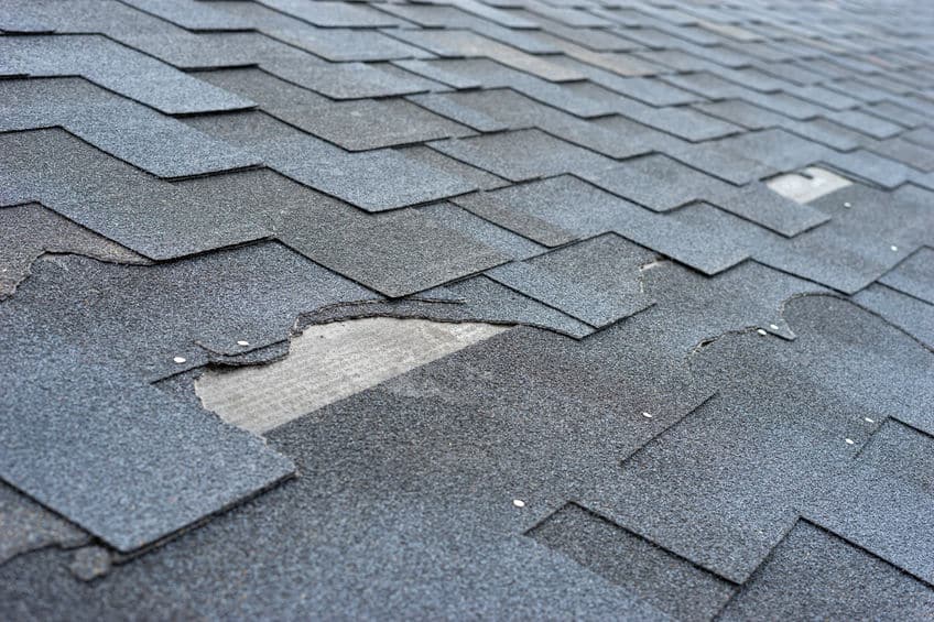 damaged and broken shingles