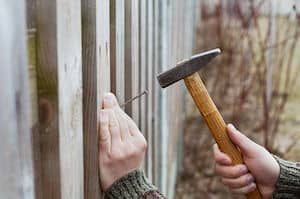 fence leaning due to pilot holes