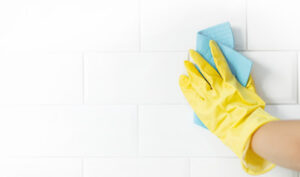 cleaning the bathroom tile