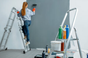 painting wall DIY Vs. Professional Help for Home Renovations